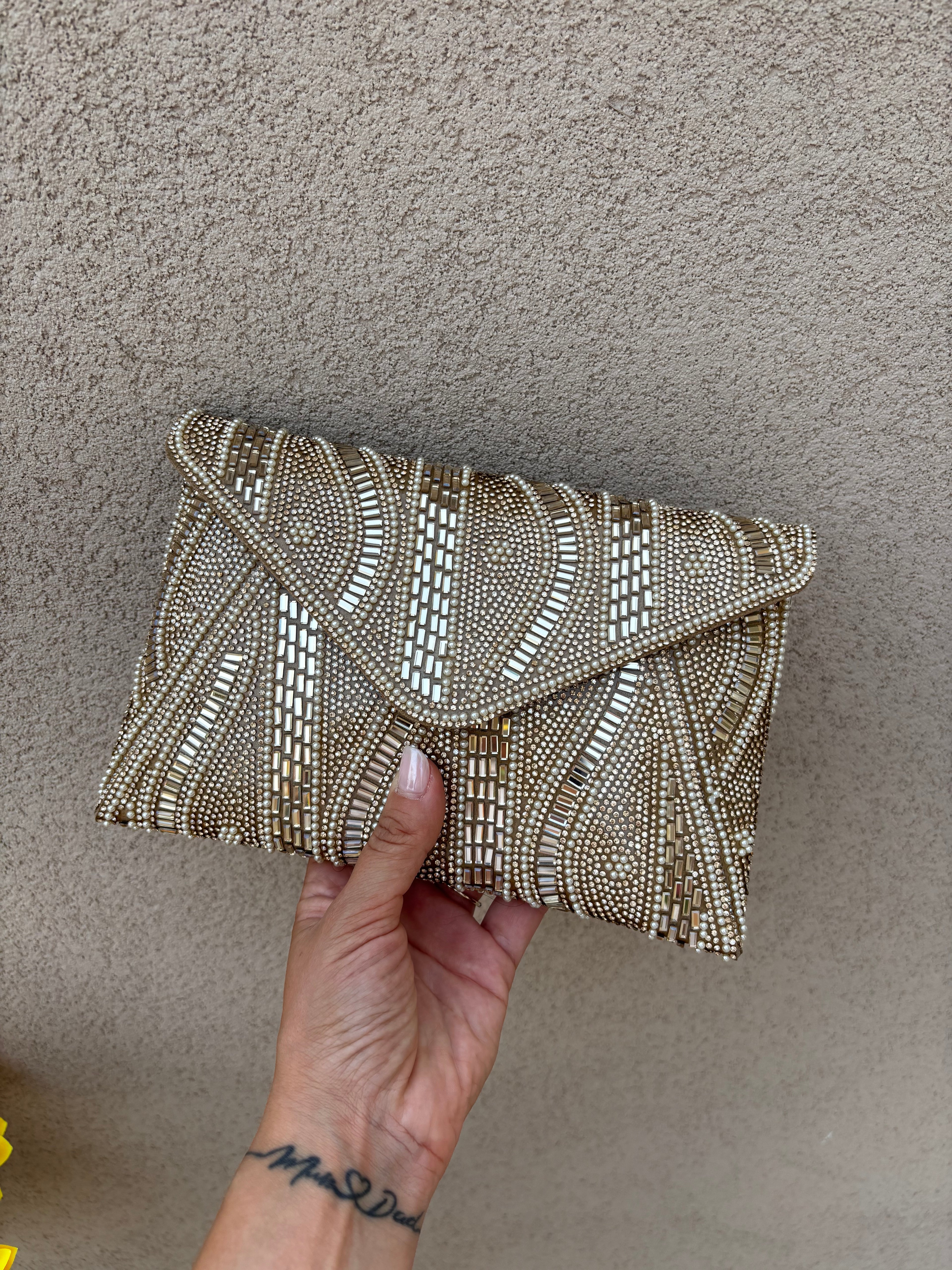 Pochette perline champagne